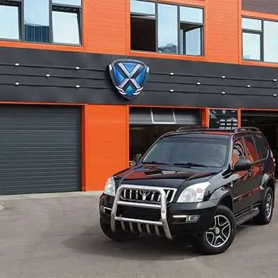 Подъемные секционные ворота для автомойки серии ProPlus